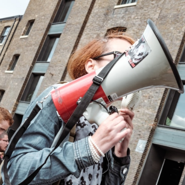 Image of woman holding a bullhorn